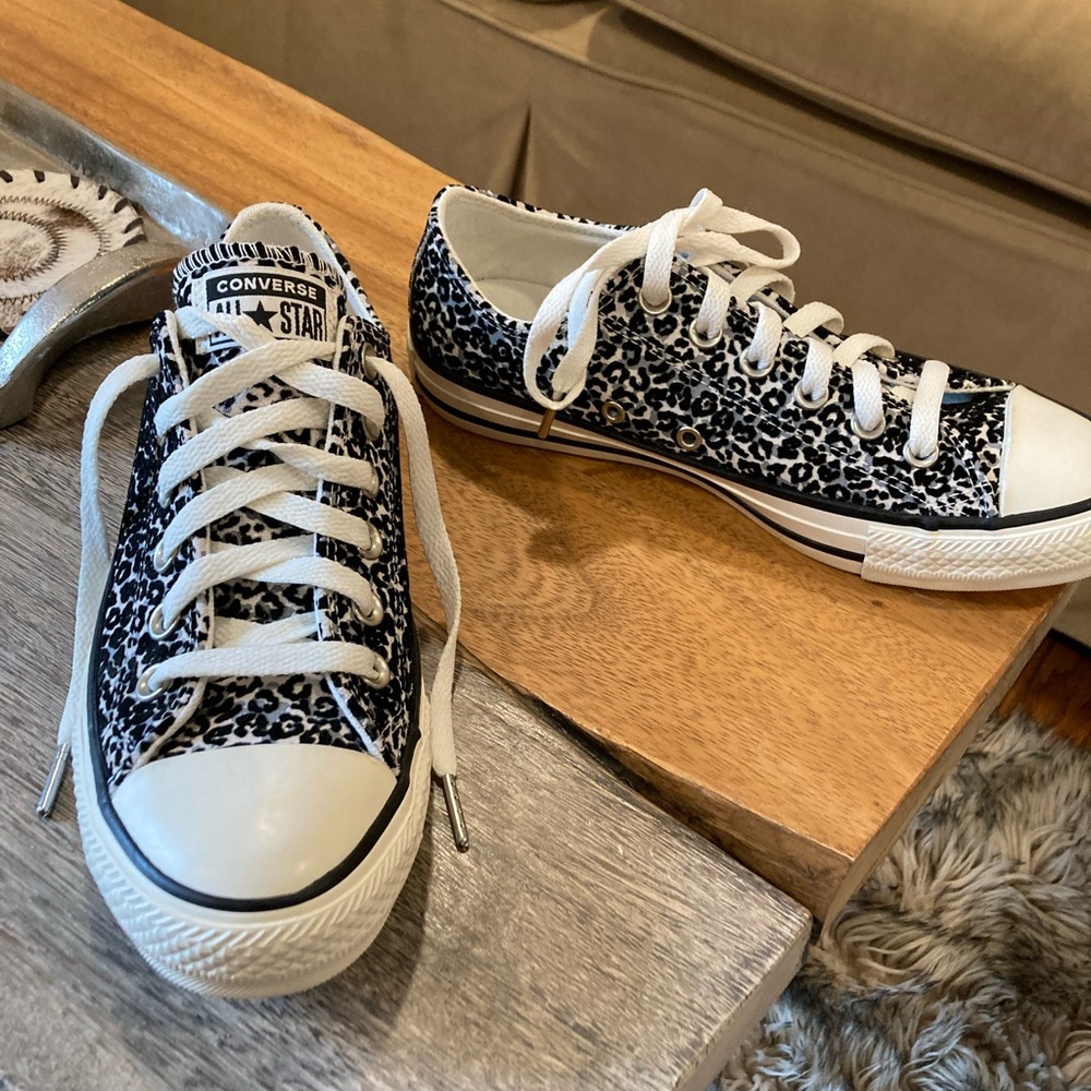 Vans lace up, animal print black and white low top.  Size 7.5.  New